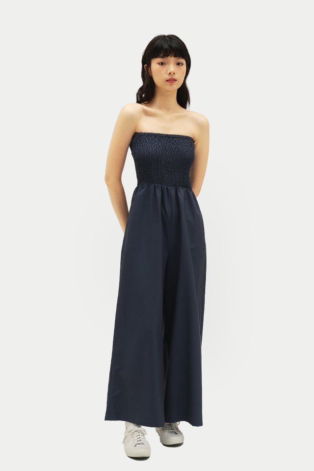 ALTHEA SHIRRED TUBE JUMPSUIT IN NAVY