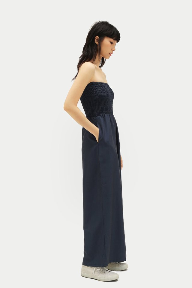 ALTHEA SHIRRED TUBE JUMPSUIT IN NAVY