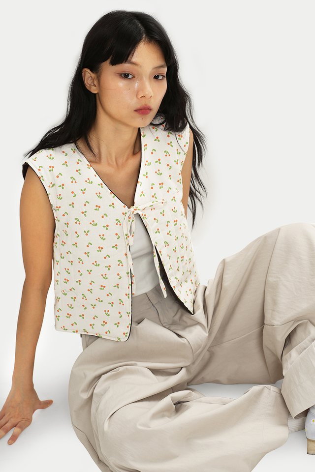 BROOKE PUFFY REVERSIBLE VEST IN BROWN/TANGERINE