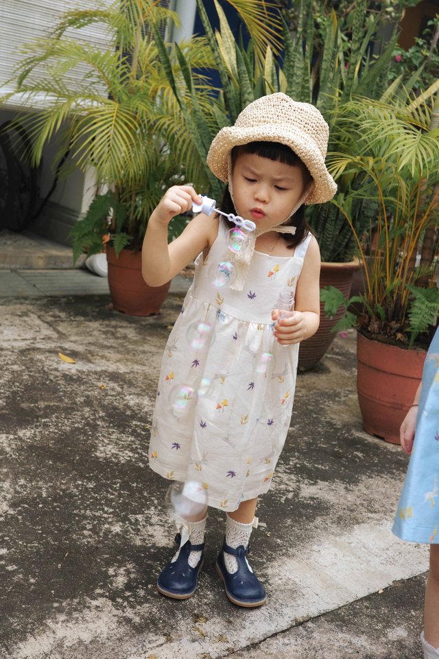 MINI "WILD WOODS" BACK BOW DRESS IN CREAM