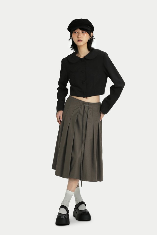 RUMI FRONT BUCKLE PLEATED SKIRT IN HOJICHA