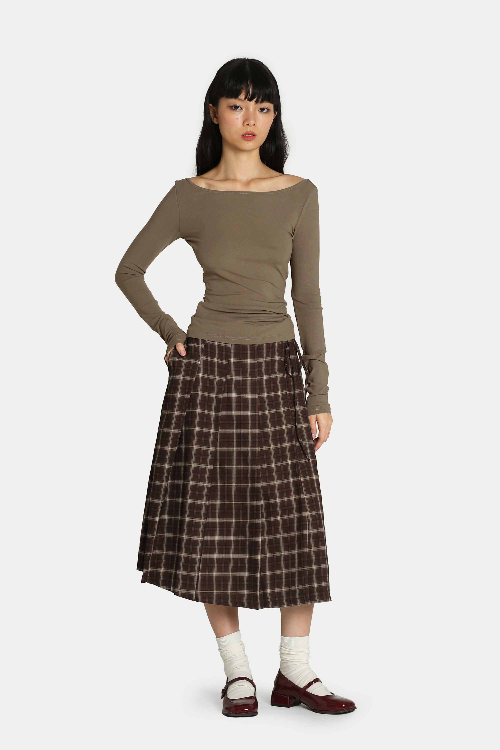 HARU CHECKERED SIDE TIE PLEATED SKIRT IN TIRAMISU