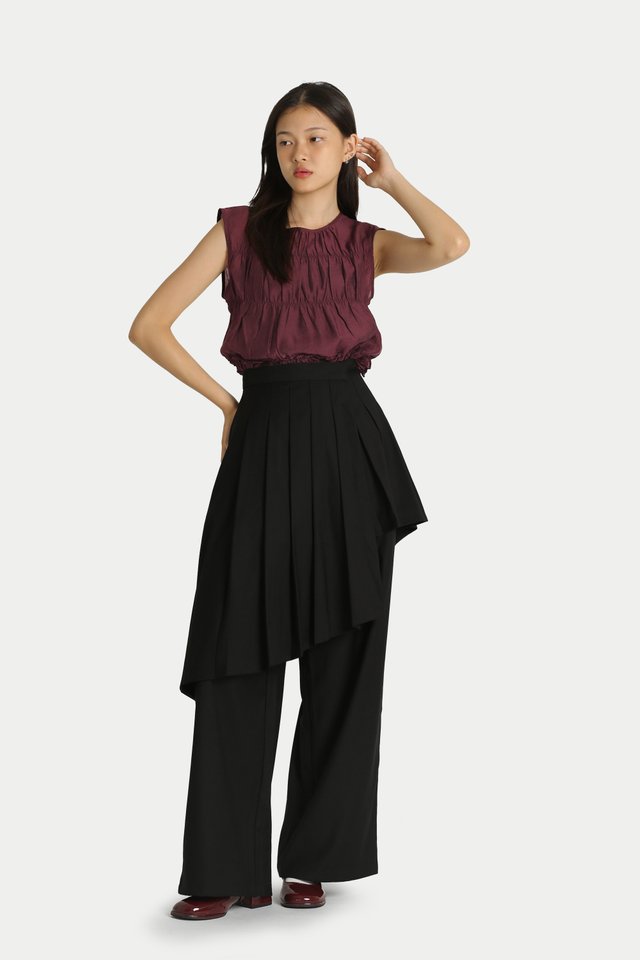DREE ASYMMETRICAL OUTER SKIRT IN BLACK