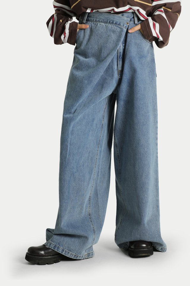 KAELYN ASYMMETRICAL PLEAT JEANS IN MID WASH