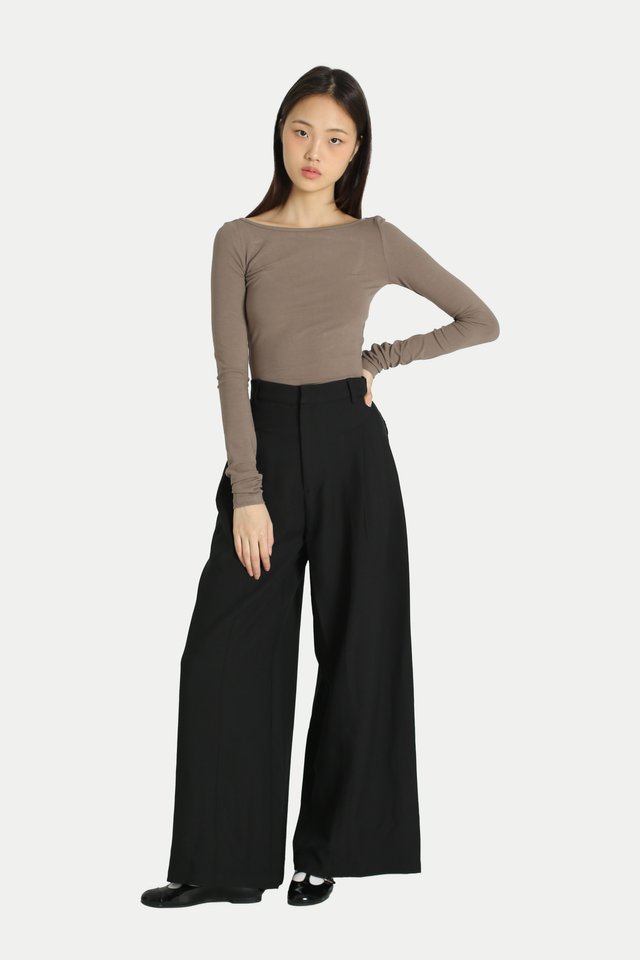 AMARI SIDE PLEAT FLARE TROUSERS IN BLACK