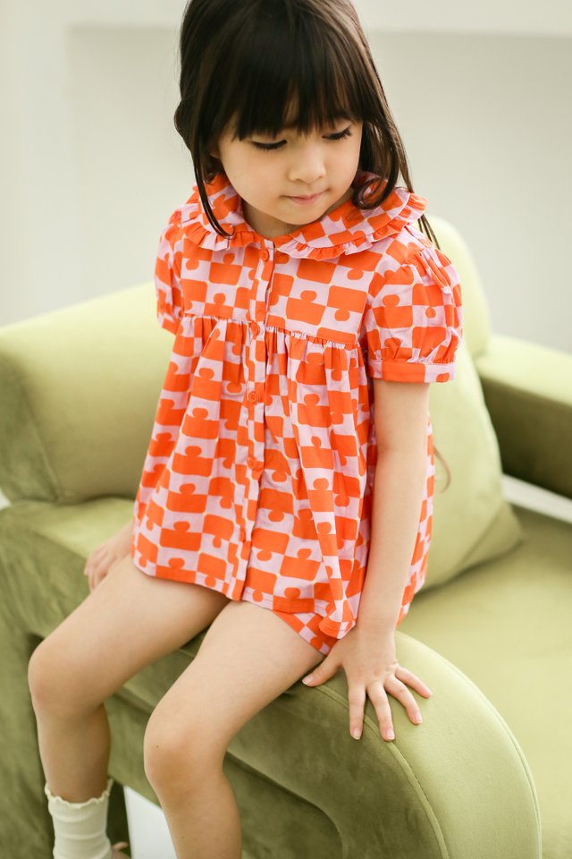 DOLLIE “JIGGY” MINI BABYDOLL TOP IN ORANGE/PINK