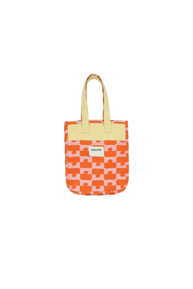 ARCADE "JIGGY" MINI TWO-WAY REVERSIBLE CARRYALL BAG IN ORANGE/PINK