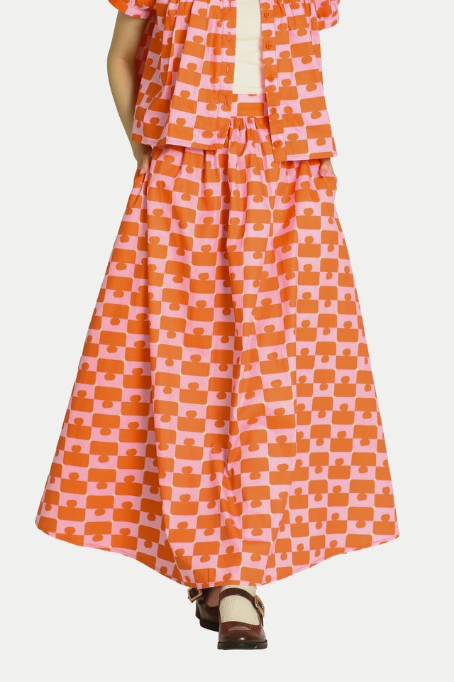 MADLYN “JIGGY” MIDI GATHER SKIRT IN ORANGE/PINK