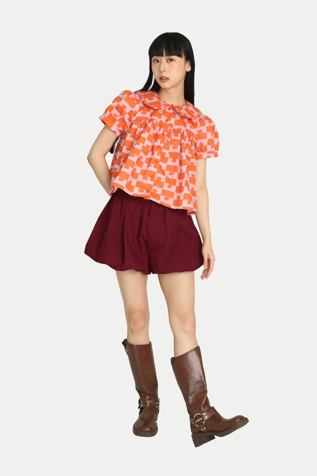 JOSIE “JIGGY” BABYDOLL TOP IN ORANGE/PINK