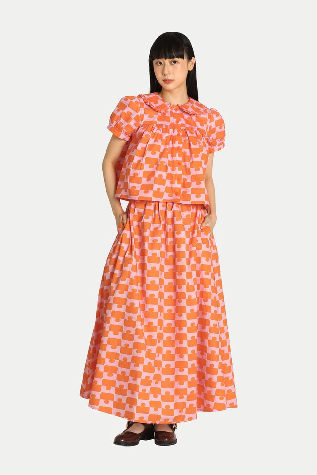 MADLYN “JIGGY” MIDI GATHER SKIRT IN ORANGE/PINK