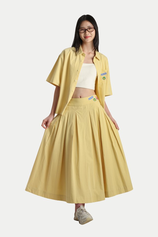 ARCADE X TESS SMITH-ROBERTS "SUPER FRESH" PLEATED SKIRT IN LEMON