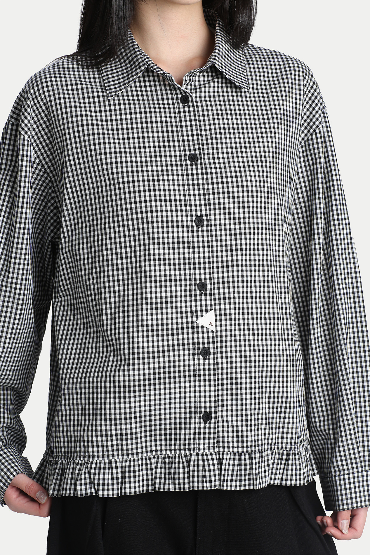 CALCIE FRILL HEM SHIRT IN BLACK GINGHAM