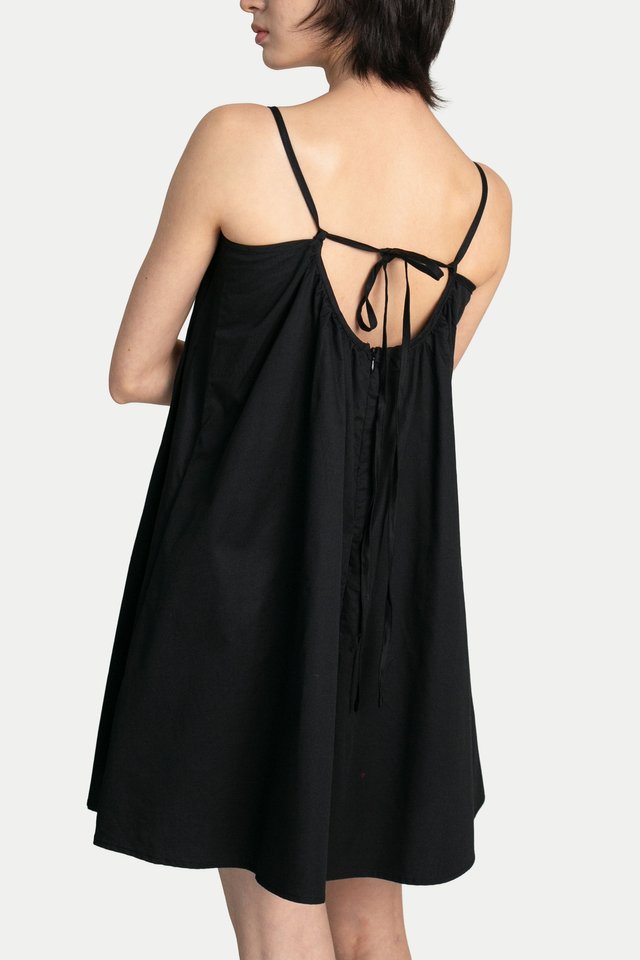 BLOSSOM PLEATED ROMPER DRESS IN BLACK