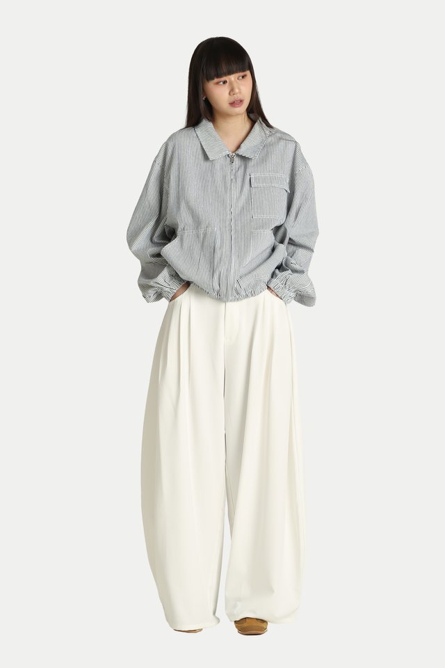 REIKO PLEATED CURVED TROUSERS IN WHITE