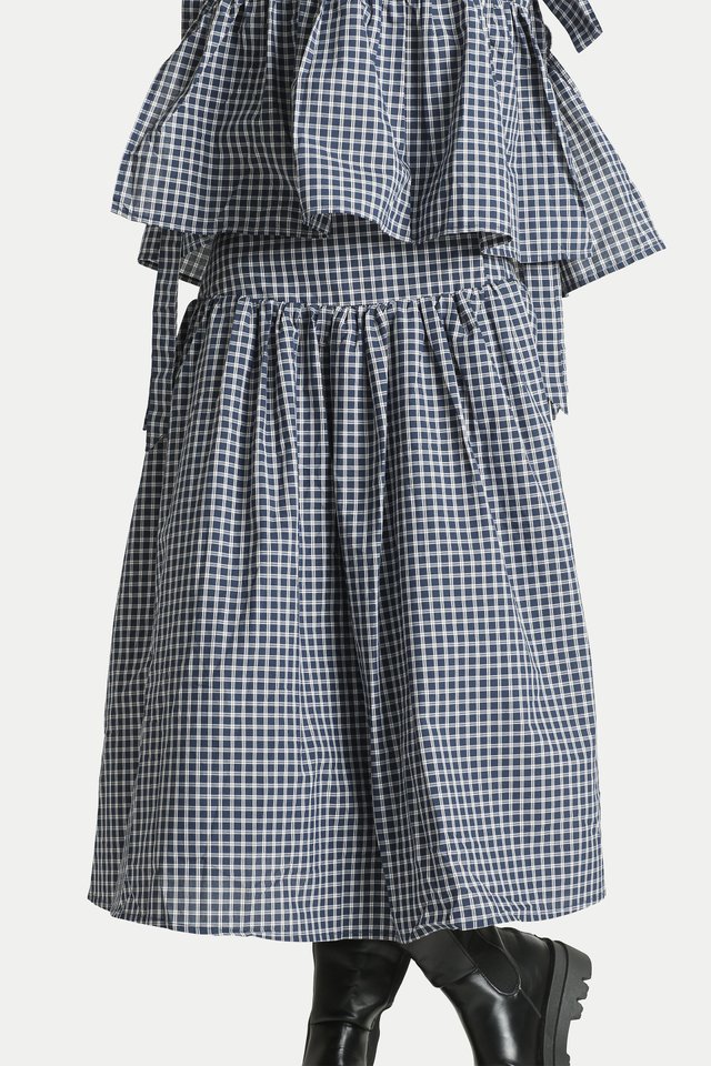 POLLY SIDE BUTTON YOKE MIDI SKIRT IN NAVY CHECKS