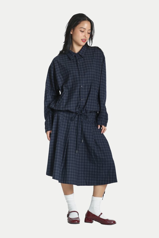 ATSUKO PLEATED MIDI SKIRT IN NAVY CHECKS
