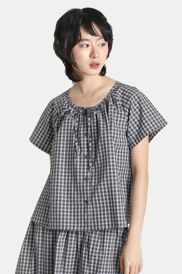 CLARA CHECKERED FLARE TOP IN DARK OLIVE