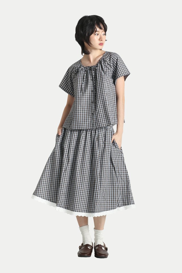 CLARA CHECKERED FLARE TOP IN DARK OLIVE